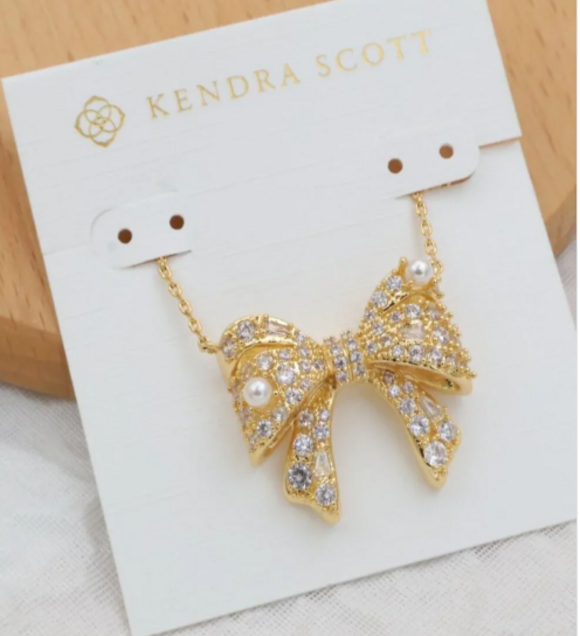 Kendra Scott. Jewelry - Kendra Scott Crystal Pearl Bow Pendant Necklace
